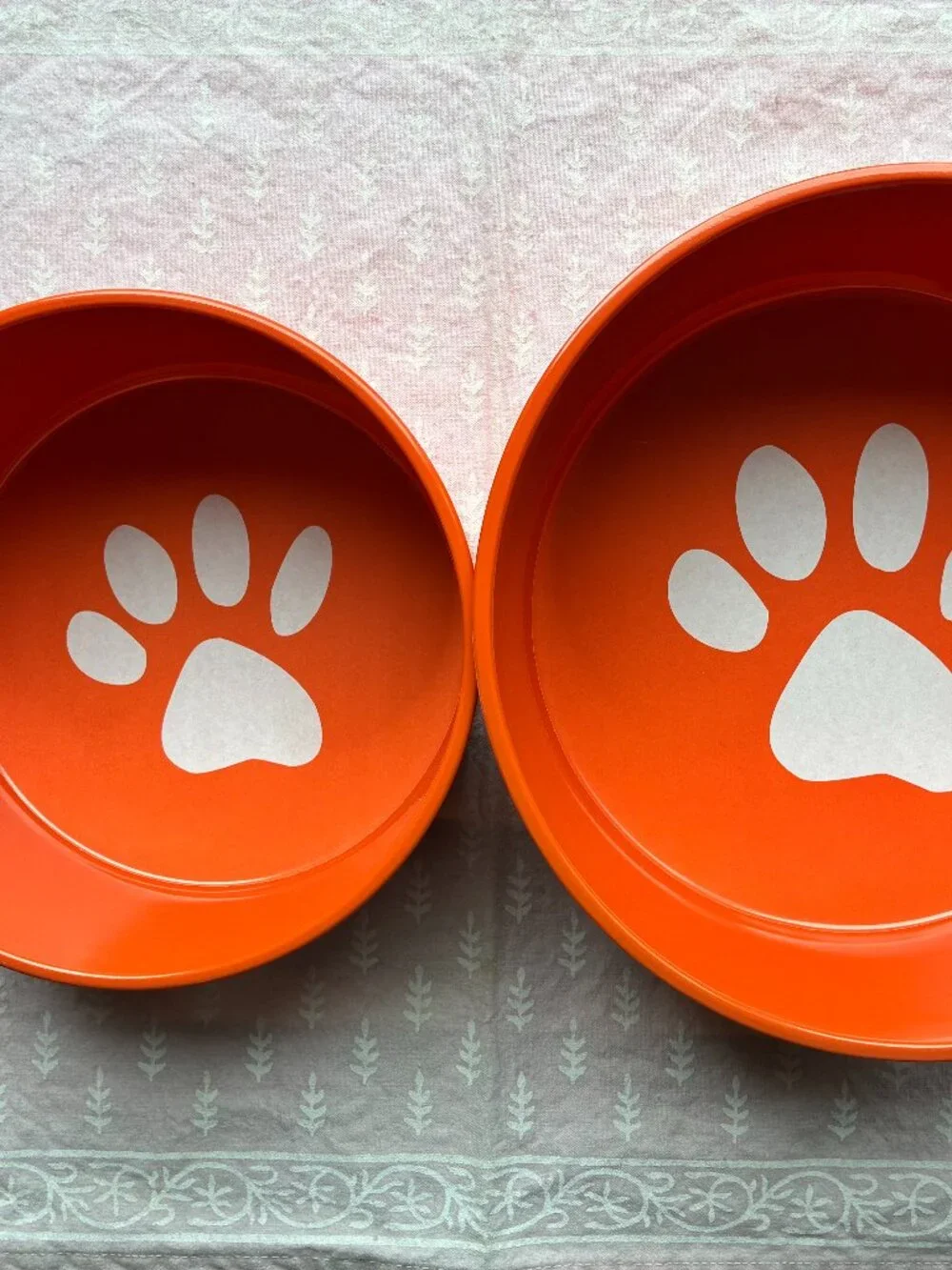 Set of orange dog bowls by Ore Originals. NWT